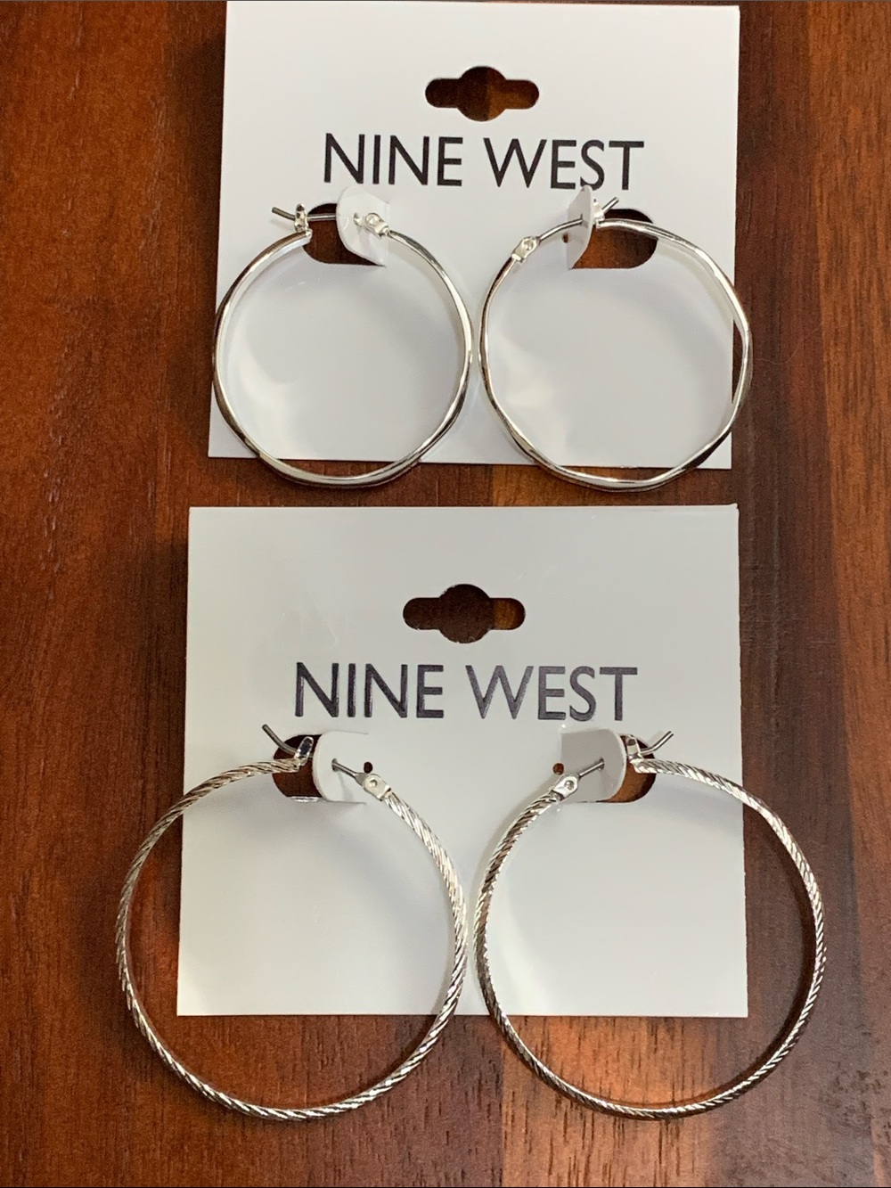 NWT Nine West 2 pair set of silver tone textured hoop earrings